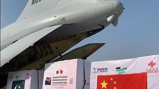 The first batch of Covid-19 coronavirus vaccine boxes unloaded from a Pakistan's air force plane after arriving from China at the Nur Khan military airbase in Islamabad on February 1. (AFP) The first batch of Covid-19 coronavirus vaccine boxes unloaded from a Pakistan's air force plane after arriving from China at the Nur Khan military airbase in Islamabad on February 1. (AFP)