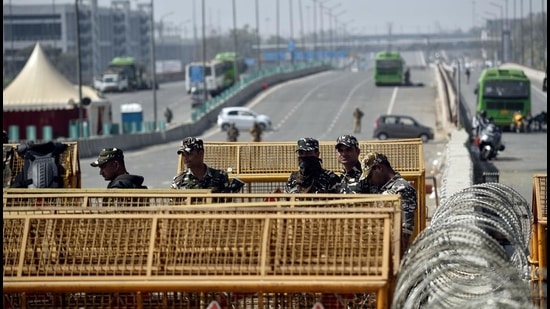 Security personnel stand guard during the ongoing farmers’ protest at Ghazipur Border, in New Delhi on March 1. (ANI) Security personnel stand guard during the ongoing farmers’ protest at Ghazipur Border, in New Delhi on March 1. (ANI)
