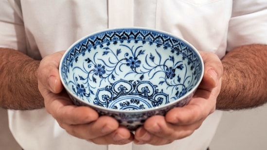 This photo, provided by Sotheby's, in New York, on Tuesday, March 2, 2021, shows a small porcelain bowl bought for $35 at a Connecticut yard sale that turned out to be a rare, 15th century Chinese artifact worth between $300,000 and $500,000. The bowl will be offered in Sotheby's Auction of Important Chinese Art, in New York, on March 17. (AP) This photo, provided by Sotheby's, in New York, on Tuesday, March 2, 2021, shows a small porcelain bowl bought for $35 at a Connecticut yard sale that turned out to be a rare, 15th century Chinese artifact worth between $300,000 and $500,000. The bowl will be offered in Sotheby's Auction of Important Chinese Art, in New York, on March 17. (AP)
