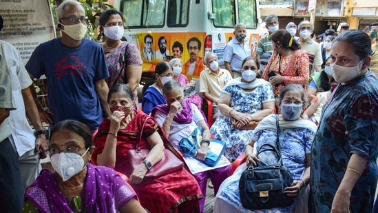 Elderly people wait for their turn to get vaccinated with Covid-19 vaccine, at a vaccination centre in Thane,(PTI)