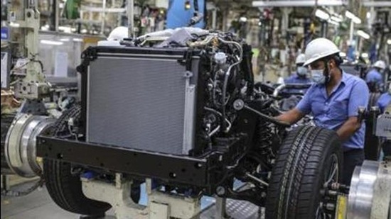 Workers at a chassis assembly line at the Toyota Kirloskar Motor Ltd. plant in Bidadi, Karnataka, India. (Bloomberg/Representational image) Workers at a chassis assembly line at the Toyota Kirloskar Motor Ltd. plant in Bidadi, Karnataka, India. (Bloomberg/Representational image)