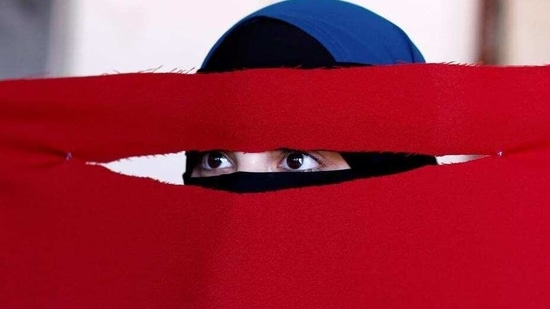 Alaa, 21, a student of health and nutrition, born in Copenhagen and wearer of the niqab, tests a face veil she created with members of the group Kvinder I Dialog (Women In Dialogue) during a workshop in preparation for a protest against the face veil ban in Copenhagen, Denmark. (Andrew Kelly / REUTERS) Alaa, 21, a student of health and nutrition, born in Copenhagen and wearer of the niqab, tests a face veil she created with members of the group Kvinder I Dialog (Women In Dialogue) during a workshop in preparation for a protest against the face veil ban in Copenhagen, Denmark. (Andrew Kelly / REUTERS)