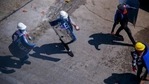 Anti-coup protesters walk with makeshift shields ahead of a demonstration in Yangon, Myanmar Thursday, March 4, 2021. (AP Photo ) Anti-coup protesters walk with makeshift shields ahead of a demonstration in Yangon, Myanmar Thursday, March 4, 2021. (AP Photo )