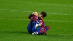 Barcelona's Gerard Pique holds his knee after getting injured during the the Copa del Rey semifinal, second leg, soccer match between FC Barcelona and Sevilla FC at the Camp Nou stadium in Barcelona, Spain, Wednesday March 3, 2021. (AP) Barcelona's Gerard Pique holds his knee after getting injured during the the Copa del Rey semifinal, second leg, soccer match between FC Barcelona and Sevilla FC at the Camp Nou stadium in Barcelona, Spain, Wednesday March 3, 2021. (AP)