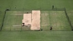 Pitch area is seen covered ahead of the fourth test cricket match between India and England at Narendra Modi Stadium in Ahmedabad.(AP) Pitch area is seen covered ahead of the fourth test cricket match between India and England at Narendra Modi Stadium in Ahmedabad.(AP)