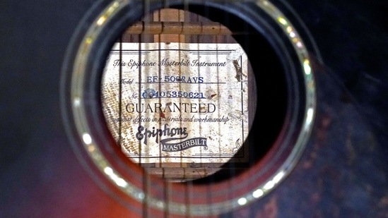 Bluesman Jimmy "Duck" Holmes says he can play the Bentonia style of blues on any type of guitar, but prefers using an acoustic model such as this one at his Blue Front Cafe in Bentonia, Miss., Jan. 21, 2021. Holmes' ninth album, "Cypress Grove," has earned a Grammy nomination for the Best Traditional Blues Album. (AP)