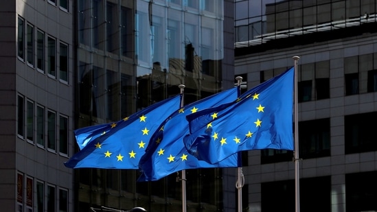 European Union flags flutter outside the European Commission headquarters in Brussels, Belgium.(Reuters)