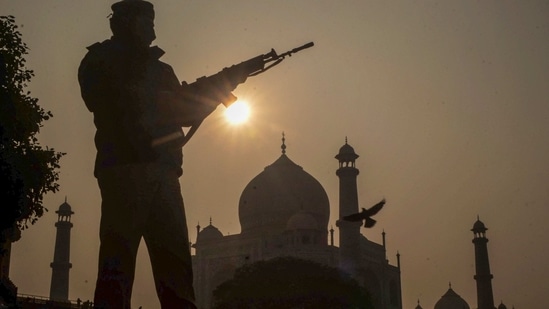 Agra: A security person stands guard near the Taj Mahal. File/Representational use(PTI)