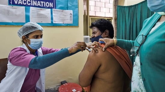 A medic administers the first dose of Covaxin vaccine to a frontline worker, during an Covid-19 inoculation drive, at Sanjeevan Hospital in New Delhi. (PTI File Photo) A medic administers the first dose of Covaxin vaccine to a frontline worker, during an Covid-19 inoculation drive, at Sanjeevan Hospital in New Delhi. (PTI File Photo)