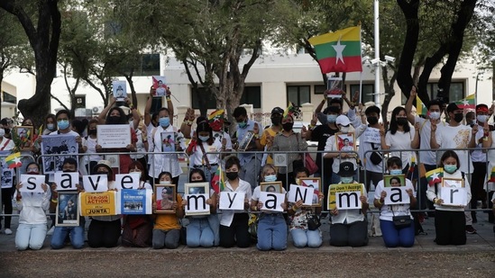 Myanmar nationals living in Thailand protest against Myanmar's military coup in front of the United Nations building in Bangkok, on March 4. The death toll was the highest since the February 1 takeover. More than 50 civilians, mostly peaceful protesters, are confirmed to have been killed by police and soldiers since then, AP reported.(Sakchai Lalit / AP)