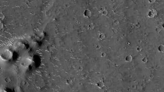 This image made available by the China National Space Administration on Thursday, March 4, 2021, shows a high-resolution photo of the surface of Mars taken by China's Tianwen-1 probe as it orbits the planet in preparation for landing. China says a cohort of astronauts have been selected and are in training to carry out four crewed missions this year as the country works to complete its first permanent orbiting space station. (CNSA via AP)(AP) This image made available by the China National Space Administration on Thursday, March 4, 2021, shows a high-resolution photo of the surface of Mars taken by China's Tianwen-1 probe as it orbits the planet in preparation for landing. China says a cohort of astronauts have been selected and are in training to carry out four crewed missions this year as the country works to complete its first permanent orbiting space station. (CNSA via AP)(AP)