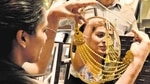 A woman looks at a gold necklace in a shop in Noida in this file photo.(Virendra Singh Gosain/ HT Photo) A woman looks at a gold necklace in a shop in Noida in this file photo.(Virendra Singh Gosain/ HT Photo)