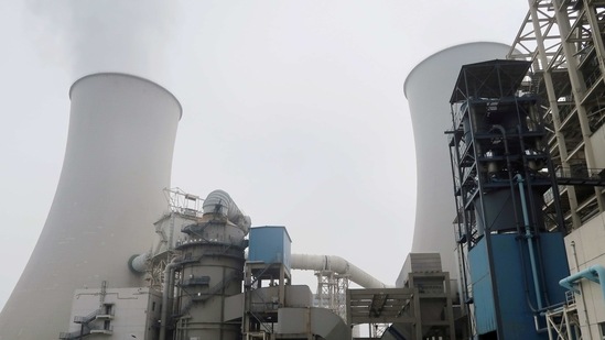 Water vapour rises from a cooling tower of a China Energy ultra-low emission coal-fired power plant.(REUTERS / File Photo)