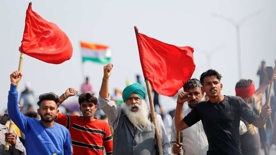 Farmers shout slogans as they take part in a three-hour "chakka jam" on a highway. (REUTERS file photo)