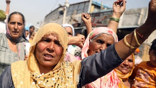 Thousands of farmers from states such as Punjab, Haryana, and Uttar Pradesh are camped at Delhi’s borders since November 27 to protest against the three farm laws, which were passed in the Parliament in September.(ANI)