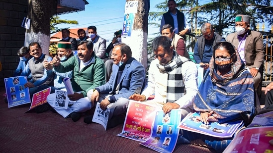 In picture - Leader of Opposition Mukesh Agnihotri along with other Congress MLAs stages a protest outside the HP assembly. (PTI) In picture - Leader of Opposition Mukesh Agnihotri along with other Congress MLAs stages a protest outside the HP assembly. (PTI)