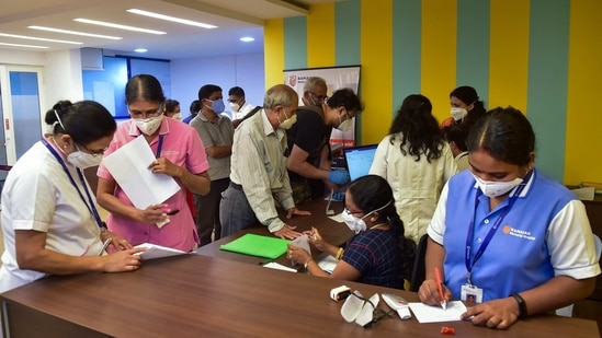 Senior citizens wait to register themselves for the first dose of the Covid-19 vaccine at a private hospital in Bengaluru.(PTI)
