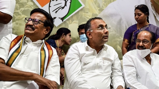 "We will fight for a respectable number of seats to keep the morale of the Congress men very high," Moily said. In picture - Congress leaders K.S. Alagiri (left), M. Veerappa Moily (right) and Dinesh Gundu Rao (centre).(PTI)