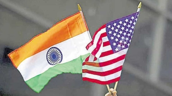 A man holds the flags of India and the US. India posted the biggest increase among origin countries for immigrants opting to become US citizens.(REUTERS) A man holds the flags of India and the US. India posted the biggest increase among origin countries for immigrants opting to become US citizens.(REUTERS)
