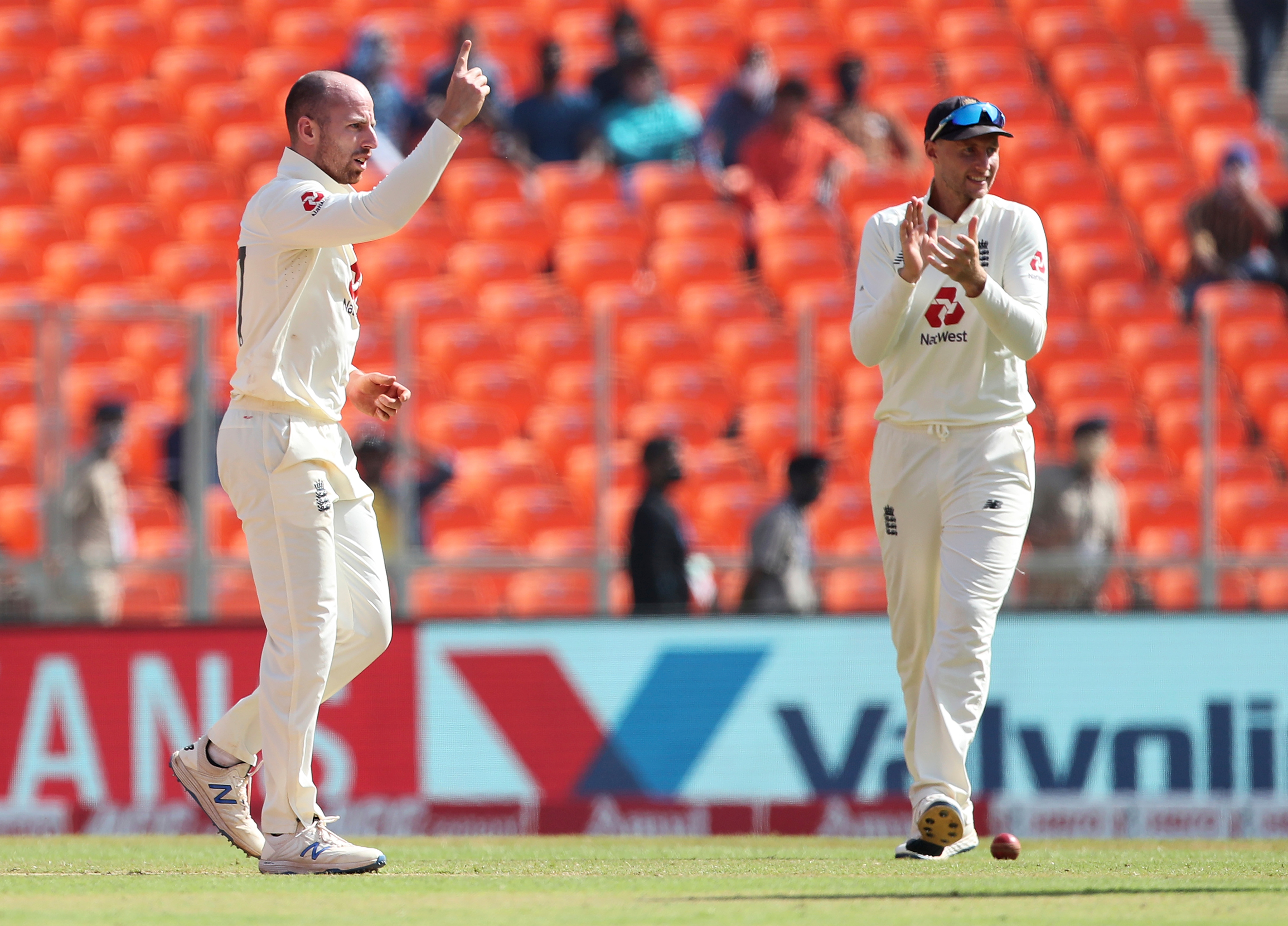 England's Jack Leach celebrates after dismissing Cheteshwar Pujara.