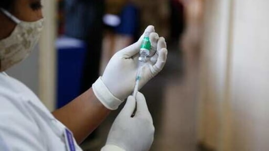 A nurse prepares to administer a shot of the Covishield COVID-19 vaccine at Sola Civil hospital in Ahmedabad, India, Wednesday, March 3, 2021. The COVID-19 vaccination drive for senior citizens and those above 45 years of age with comorbidities began in government and designated private hospitals in Gujarat on Monday along with the rest of the country. (AP Photo/Ajit Solanki)(AP) A nurse prepares to administer a shot of the Covishield COVID-19 vaccine at Sola Civil hospital in Ahmedabad, India, Wednesday, March 3, 2021. The COVID-19 vaccination drive for senior citizens and those above 45 years of age with comorbidities began in government and designated private hospitals in Gujarat on Monday along with the rest of the country. (AP Photo/Ajit Solanki)(AP)