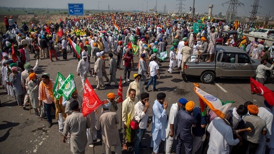 Farmers participating in the blockade protest near New Delhi on March 6. Multiple rounds of talks between the government and farmers have failed to end the stalemate. The farmers have rejected an offer from the government to put the laws on hold for 18 months, saying they want a complete repeal.(Altaf Qadri/AP)