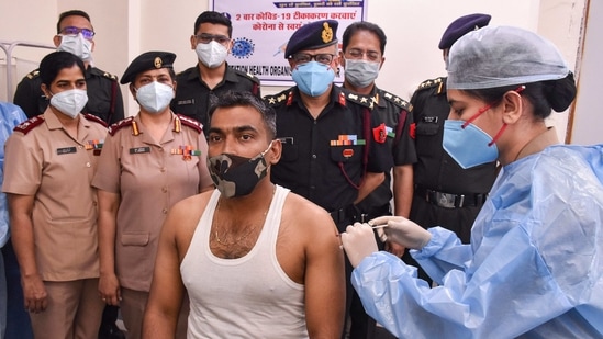 Indian Army personnel receives a dose of COVID-19 vaccine at a military hospital in Jabalpur. (PTI Photo) Indian Army personnel receives a dose of COVID-19 vaccine at a military hospital in Jabalpur. (PTI Photo)