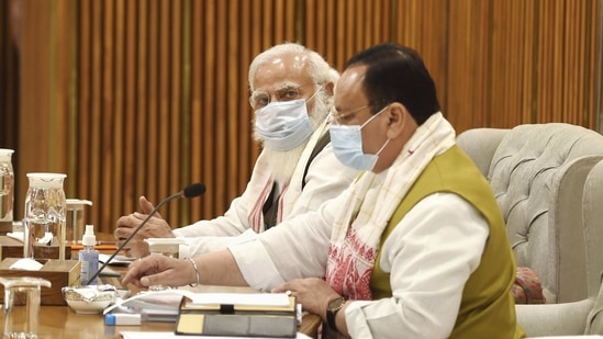 Prime Minister Narendra Modi and BJP National President JP Nadda during the election committee meeting for Assam Assembly elections, at BJP Headquarters in New Delhi, Thursday.(PTI)