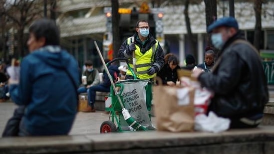 Paris street sweeper Ludovic Franceschet aka Ludovic_off cleans the street in Paris, France, March 4, 2021. Fed up with people throwing litter on the ground in the COVID-19 pandemic, her has taken to TikTok to spread his message: put your trash in a garbage can.(Reuters)