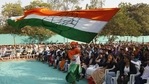 A man waves a Congress flag at a rally in Gujarat.(AP File Photo) A man waves a Congress flag at a rally in Gujarat.(AP File Photo)