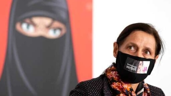 Monika Ruegsegger-Hurschler, National Councillor SVP, gives an interview at the meeting place of the supporters of the initiative to ban face coverings.(AP)