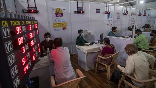 People queue to register for Covid-19 vaccination at BKC vaccination centre, in Mumbai on March 6. India is also one of the fastest countries to reach the 20 million milestone.(Pratik Chorge / HT Photo)