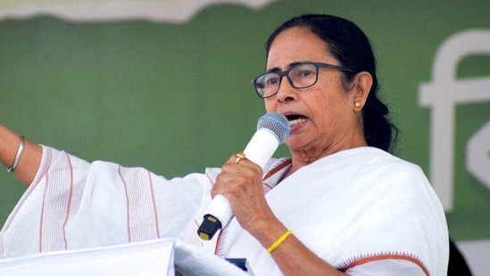 Mamata Banerjee and others were seen carrying cardboard replicas of LPG cylinders as she led the protest, which is being seen as a counter to PM Modi’s massive rally at the Brigade Parade Ground in Kolkata. (ANI Photo) Mamata Banerjee and others were seen carrying cardboard replicas of LPG cylinders as she led the protest, which is being seen as a counter to PM Modi’s massive rally at the Brigade Parade Ground in Kolkata. (ANI Photo)