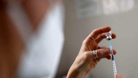 Needing to vaccinate 200,000 people a day to reach its targets, it's not clear whether the government will get enough doses to have a quick enough impact to avoid a new lockdown.( REUTERS) Needing to vaccinate 200,000 people a day to reach its targets, it's not clear whether the government will get enough doses to have a quick enough impact to avoid a new lockdown.( REUTERS)
