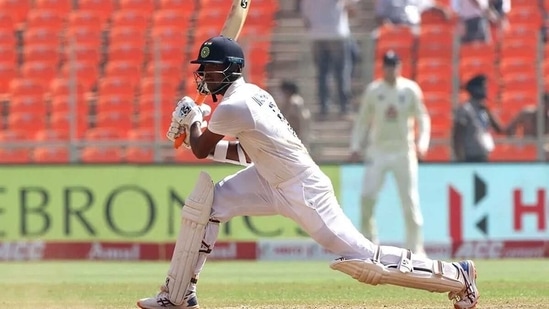 Washington Sundar drives en route to his highest Test score. (BCCI)