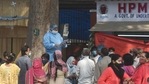 A doctor wearing PPE coveralls distributes Covid-19 test reports to patients at LNJP Hospital, in New Delhi. (Sanchit Khanna / Hindustan Times) A doctor wearing PPE coveralls distributes Covid-19 test reports to patients at LNJP Hospital, in New Delhi. (Sanchit Khanna / Hindustan Times)