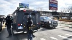 Detroit police monitor the scene of a shooting at the Rivertown Inn and Suites on East Jefferson Avenue in Detroit.(AP) Detroit police monitor the scene of a shooting at the Rivertown Inn and Suites on East Jefferson Avenue in Detroit.(AP)