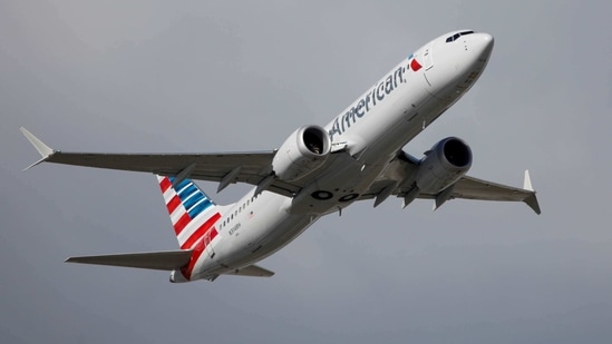 American Airlines flight 718, the first US Boeing 737 MAX commercial flight since regulators lifted a 20-month grounding in November, takes off from Miami, Florida, US. (Reuters) American Airlines flight 718, the first US Boeing 737 MAX commercial flight since regulators lifted a 20-month grounding in November, takes off from Miami, Florida, US. (Reuters)