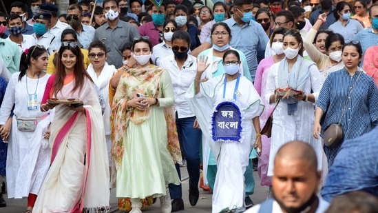 Chief Minister Mamata Banerjee at a road show on the occasion of International Women's Day, in Kolkata on Monday.(ANI) Chief Minister Mamata Banerjee at a road show on the occasion of International Women's Day, in Kolkata on Monday.(ANI)