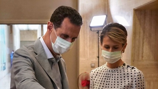 Syrian President Bashar al-Assad and his wife Asma (Syrian Presidency Facebook page / AFP)