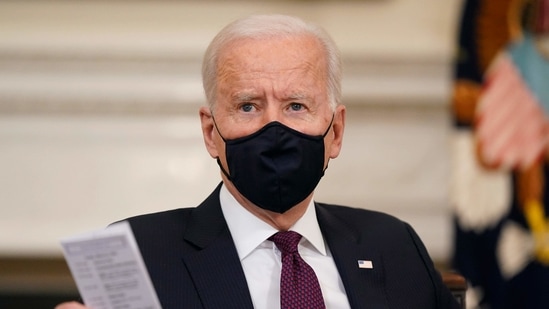 Washington : President Joe Biden participates in a roundtable discussion on a coronavirus relief package in the State Dining Room of the White House in Washington, Friday, March 5, 2021.AP/PTI(AP03_06_2021_000004B)(AP) Washington : President Joe Biden participates in a roundtable discussion on a coronavirus relief package in the State Dining Room of the White House in Washington, Friday, March 5, 2021.AP/PTI(AP03_06_2021_000004B)(AP)