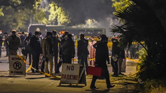 Security personnel inspect the area after a low intensity blast outside the Israeli Embassy, in New Delhi, Friday, Jan. 29, 2021.(PTI) Security personnel inspect the area after a low intensity blast outside the Israeli Embassy, in New Delhi, Friday, Jan. 29, 2021.(PTI)