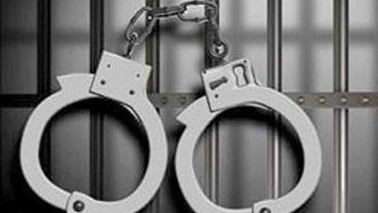 Representative photo of handcuffs(Shutterstock) Representative photo of handcuffs(Shutterstock)