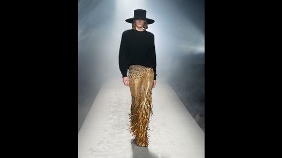 A model in a pair of gold fringed pants offset with a basic neutral separate. (Photo: Instagram/AlbertaFerretti) A model in a pair of gold fringed pants offset with a basic neutral separate. (Photo: Instagram/AlbertaFerretti)