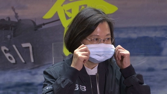In this image from a video, Taiwanese President Tsai Ing-wen adjusts her face mask while delivering a speech to the servicemembers of the 131st Flotilla in the northern port of Keelung, Taiwan.(AP) In this image from a video, Taiwanese President Tsai Ing-wen adjusts her face mask while delivering a speech to the servicemembers of the 131st Flotilla in the northern port of Keelung, Taiwan.(AP)