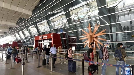 Passengers queue to get their documents verified before entering the IGI Airport amid the lockdown in New Delhi on May 30, 2020.(Sanjeev Verma/HT Photo)