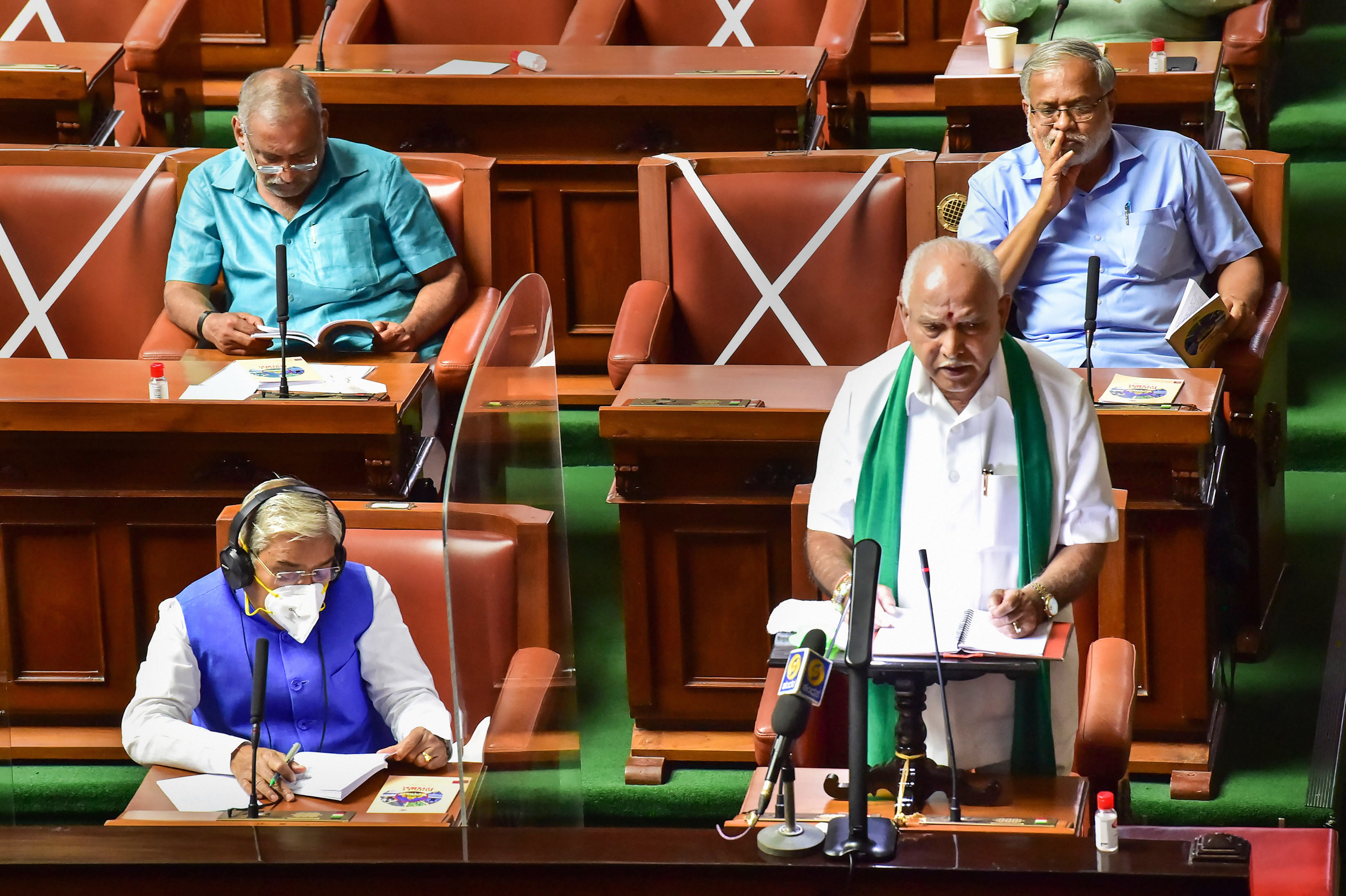 Karnataka chief minister BS Yediyurappa presents the state budget 2021-22 in the Vidhana Soudha, Bengaluru, March 8, 2021. (PTI Photo) Karnataka chief minister BS Yediyurappa presents the state budget 2021-22 in the Vidhana Soudha, Bengaluru, March 8, 2021. (PTI Photo)