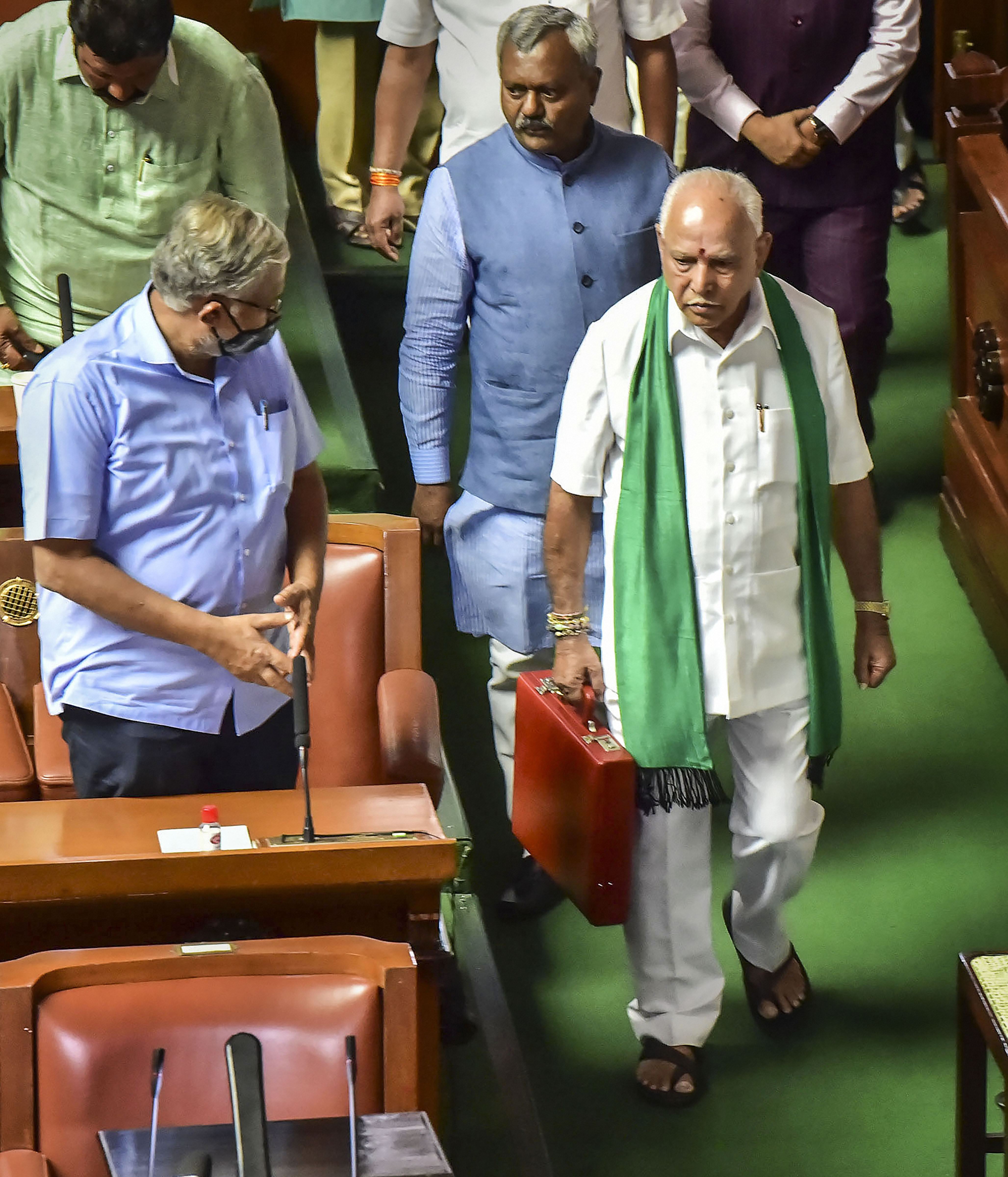 Karnataka chief minister BS Yediyurappa arrives to present the state budget 2021-22 in the Vidhana Soudha, Bengaluru, March 8, 2021. (PTI Photo) Karnataka chief minister BS Yediyurappa arrives to present the state budget 2021-22 in the Vidhana Soudha, Bengaluru, March 8, 2021. (PTI Photo)