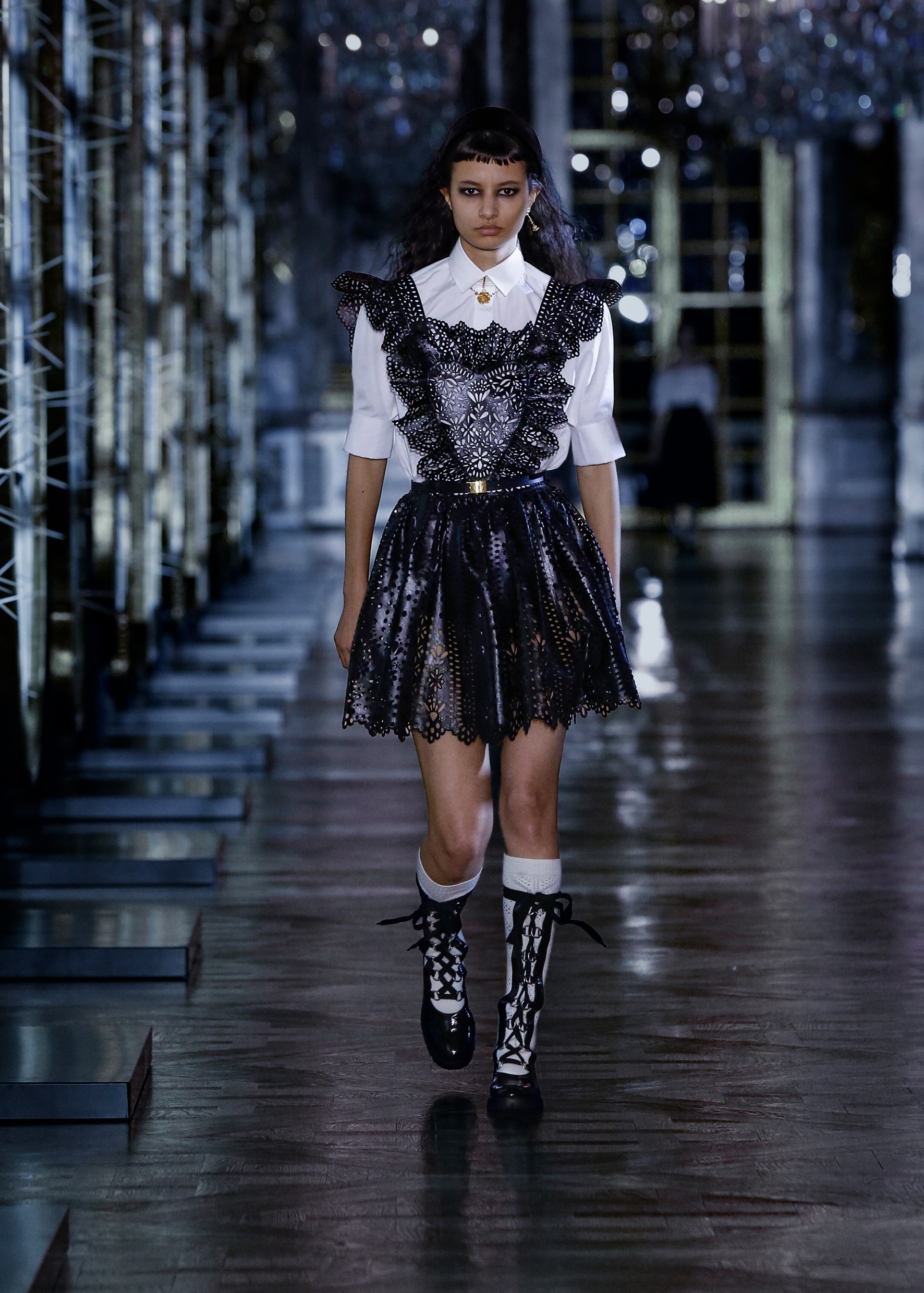 Crisp white statement collared pieces were clashed with broderie anglaise knits or laser-cut leather creating a visual tension of sorts. (Photo: Instagram/Dior) Crisp white statement collared pieces were clashed with broderie anglaise knits or laser-cut leather creating a visual tension of sorts. (Photo: Instagram/Dior)