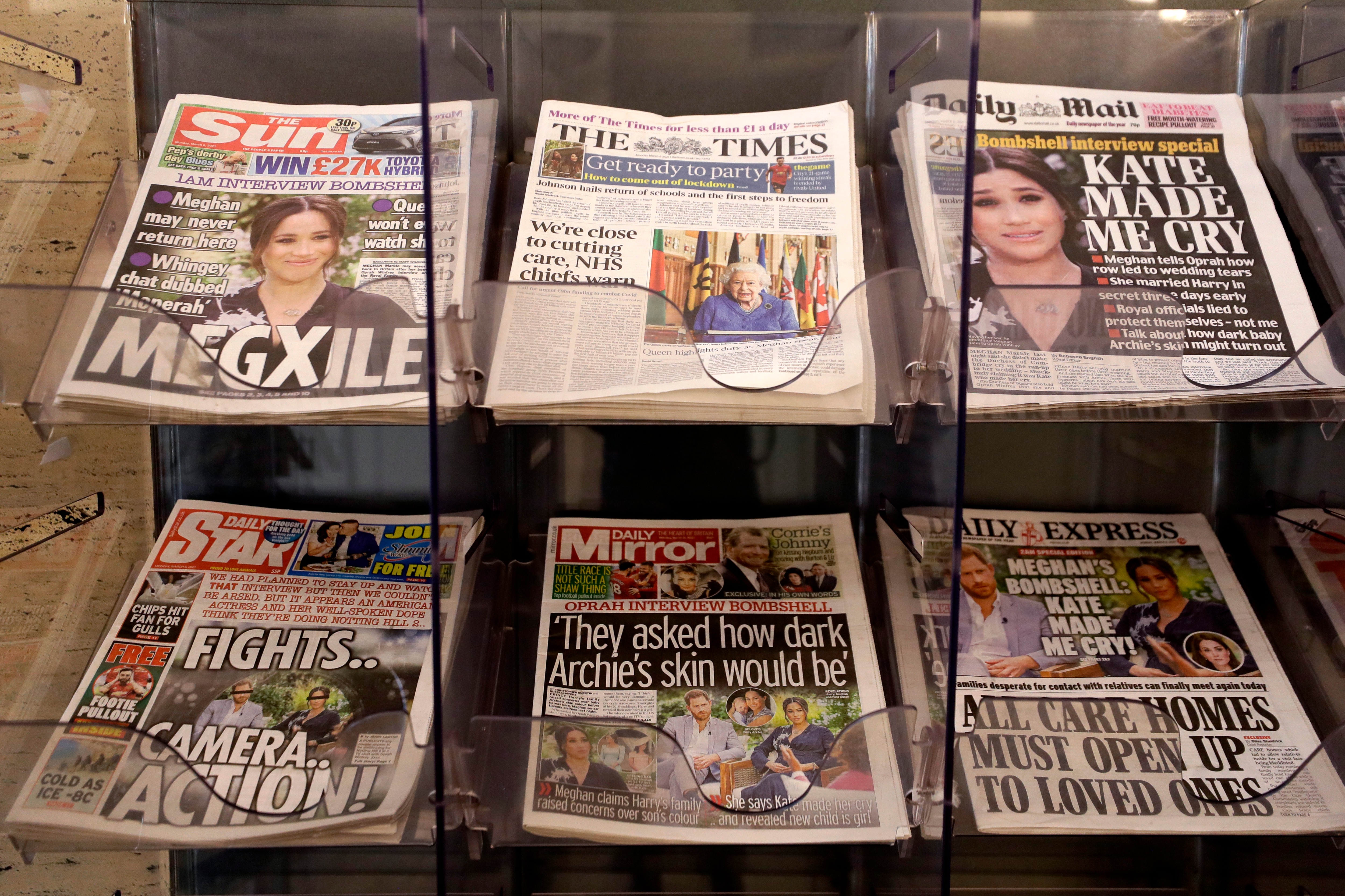 Newspapers are displayed for sale outside a shop in London.(AP) Newspapers are displayed for sale outside a shop in London.(AP)